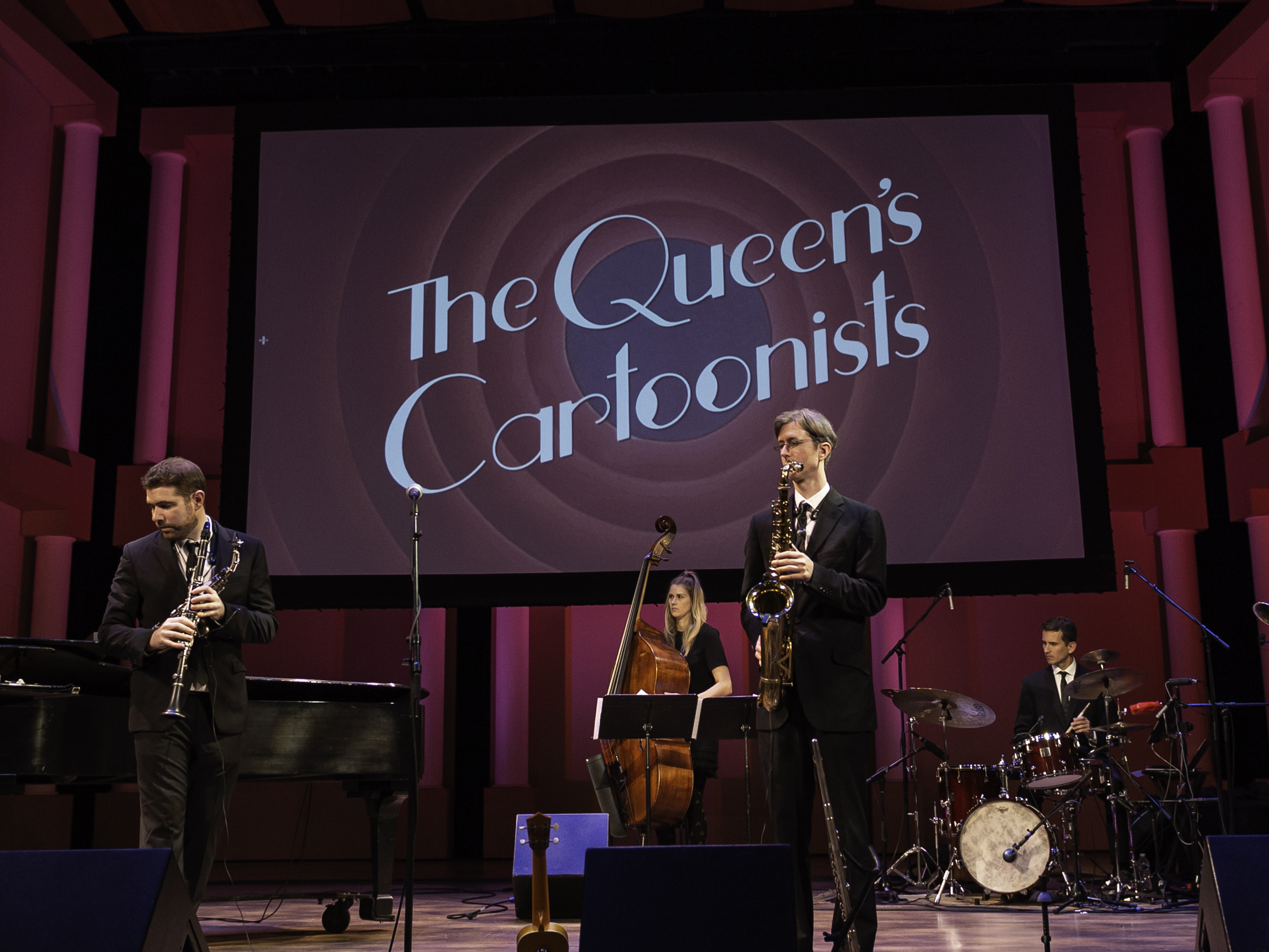 caption: The Queen's Cartoonists perform at the Miller Symphony Hall in Allentown, PA on November 22, 2019.