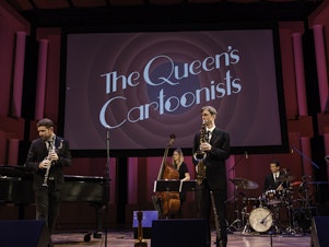 caption: The Queen's Cartoonists perform at the Miller Symphony Hall in Allentown, PA on November 22, 2019.