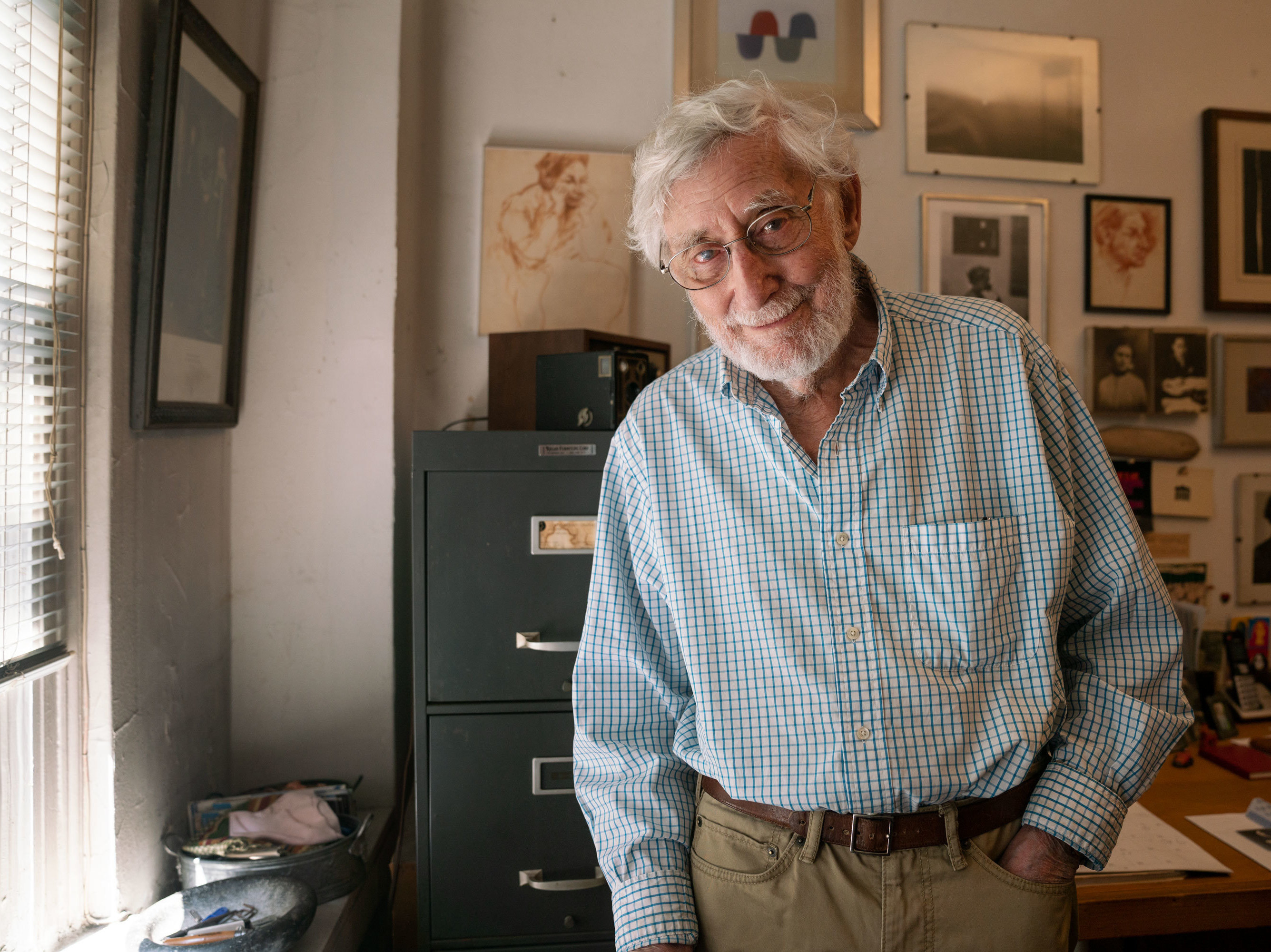 caption: Gert Berliner, 94, tied the little stuffed monkey to his bicycle when he was a child in Berlin.
