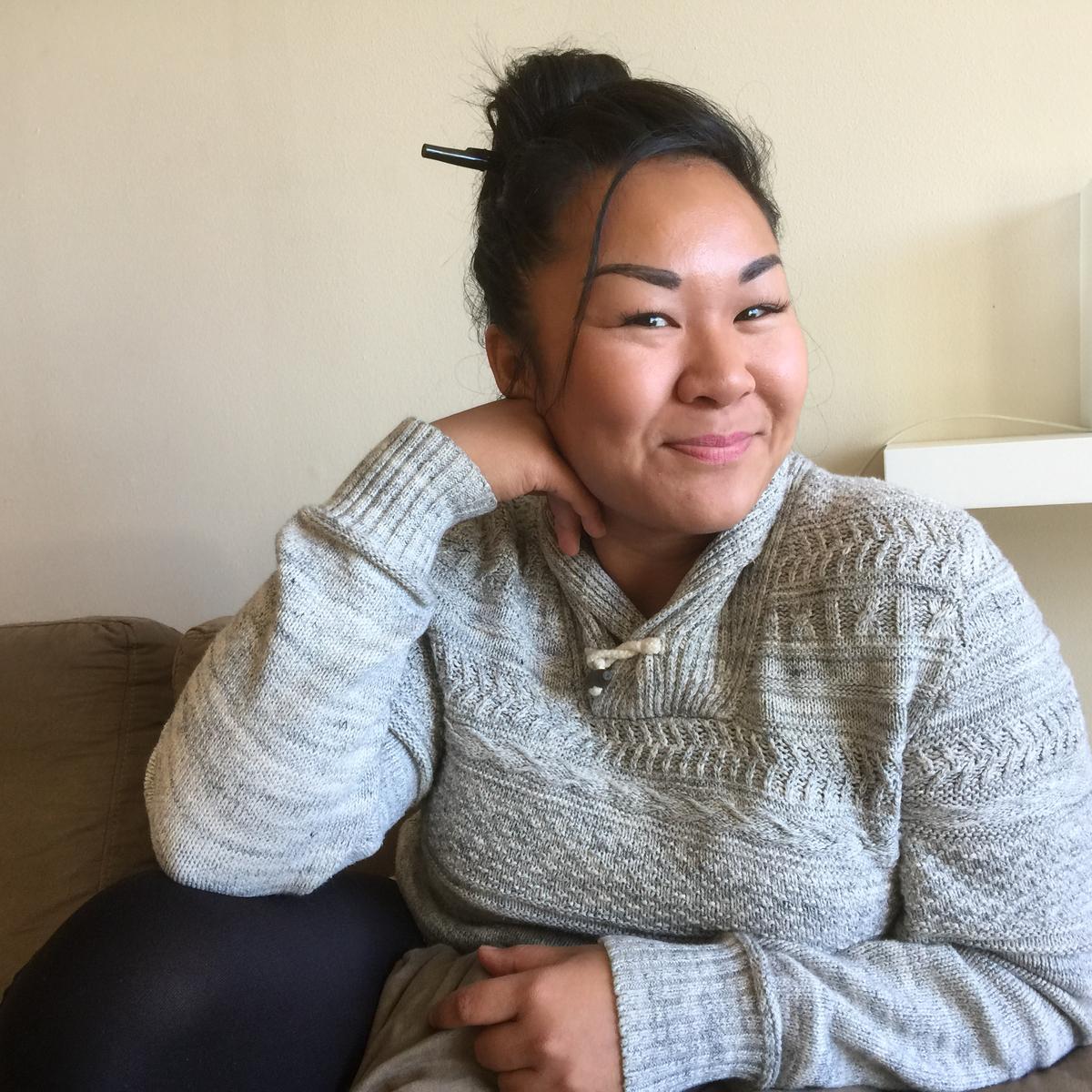 caption: Artist Sara Porkalob in her Queen Anne apartment.