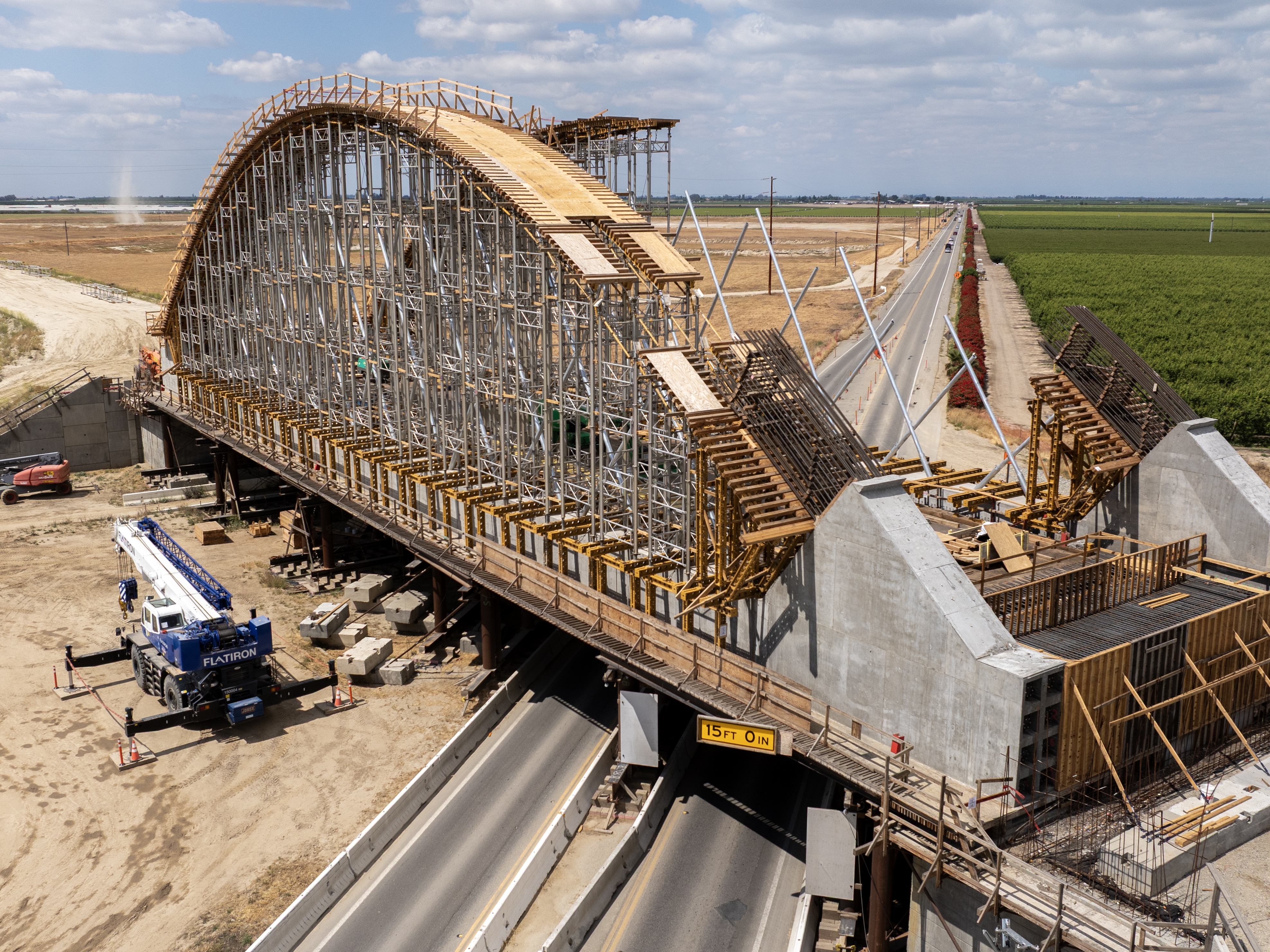 caption: The Tied Arch Bridge construction site in Fresno County, Calif.
