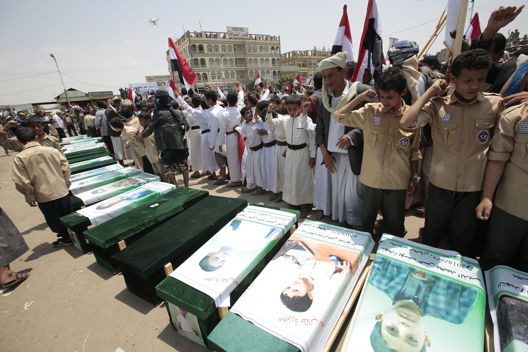 caption: Yemeni people attend the funeral of victims of a Saudi-led airstrike, in Saada, Yemen, Monday, Aug. 13, 2018. Yemen's shiite rebels are backing a United Nations' call for an investigation into the airstrike in the country's north that killed dozens of people including many children. (Hani Mohammed/AP)