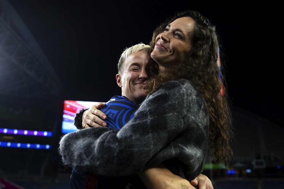 caption: Megan Rapinoe and Sue Bird share a hug following Rapinoe’s last regular-season NWSL home game against the Washington Spirit on Friday, Oct. 6, 2023, at Lumen Field in Seattle. 