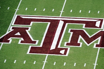 caption: Texas A&M University announced Friday, July 21, 2023, that its school president has resigned after a Black journalist's celebrated hiring at one of the nation's largest campuses unraveled over pushback of her diversity and inclusion work. Here, the Texas A&M logo on Kyle Field is seen before an NCAA college football game against Florida, in College Station, Texas, Sept. 8, 2012.