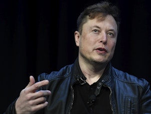 caption: Tesla and SpaceX CEO Elon Musk speaks at the SATELLITE Conference and Exhibition, March 9, 2020, in Washington.