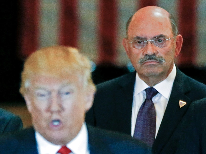 caption: Allen Weisselberg, the Trump Organization's longtime chief financial officer, looks on as then-U.S. Republican presidential candidate Donald Trump speaks during a 2016 news conference at Trump Tower in New York City.