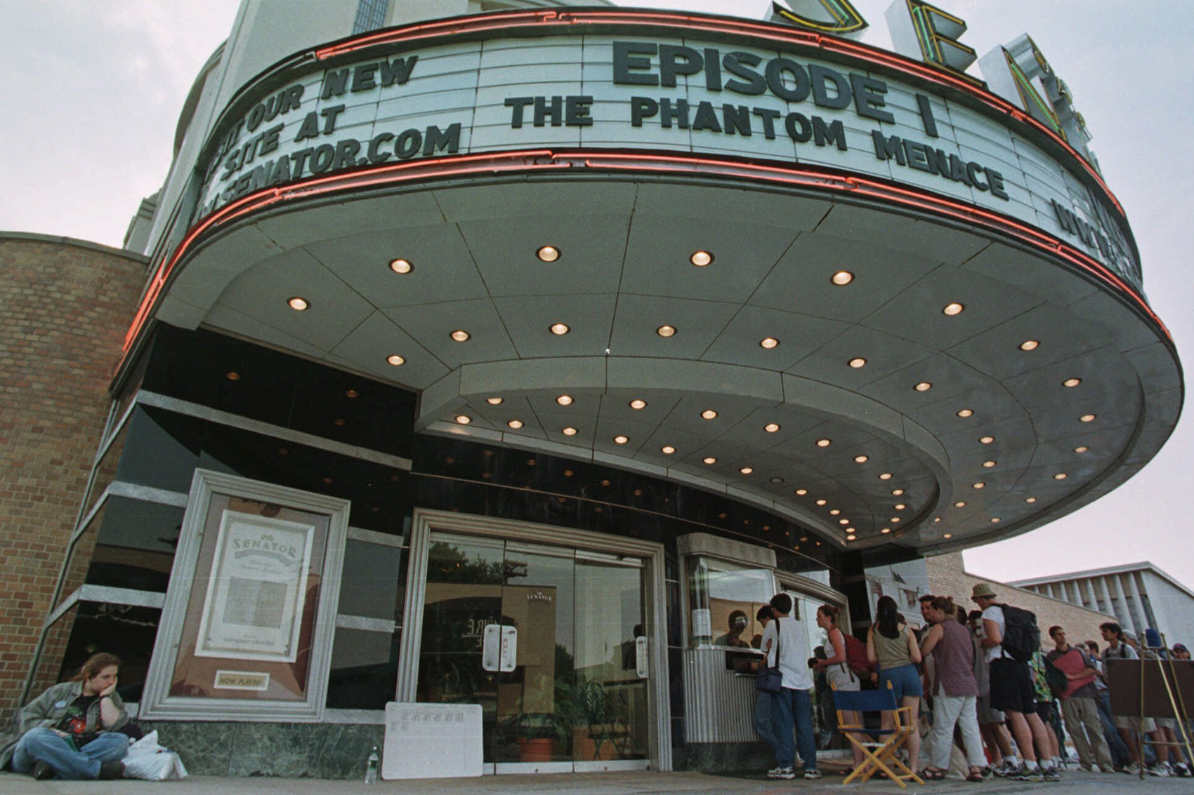 caption: Crowds of over 500 people stood in line for "Star Wars" tickets that went on sale Wednesday, May 12, 1999 at The Senator theatre in Baltimore for the premier of "The Phantom Menace." (Gail Burton/AP)