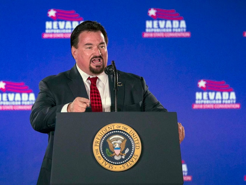 caption: Nevada state Republican Party Chair Michael McDonald is seen in 2018 in Las Vegas. On Friday, a judge dismissed a criminal indictment against six Republicans, including McDonald, accused of submitting certificates to Congress falsely declaring Donald Trump the winner of the state’s 2020 presidential election.