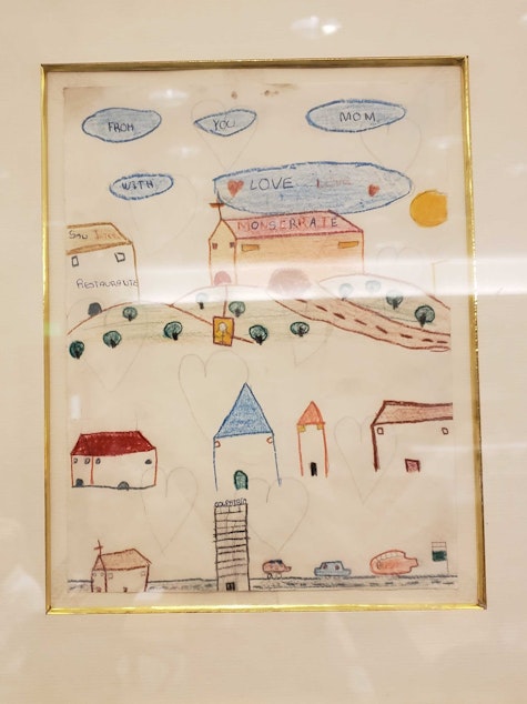 caption: A drawing from a migrant child hangs in this courtroom in South King County. 