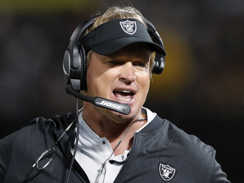caption: Jon Gruden, pictured in 2018, is suing the NFL and Commissioner Roger Goodell.