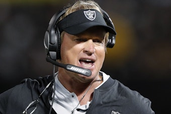 caption: Jon Gruden, pictured in 2018, is suing the NFL and Commissioner Roger Goodell.