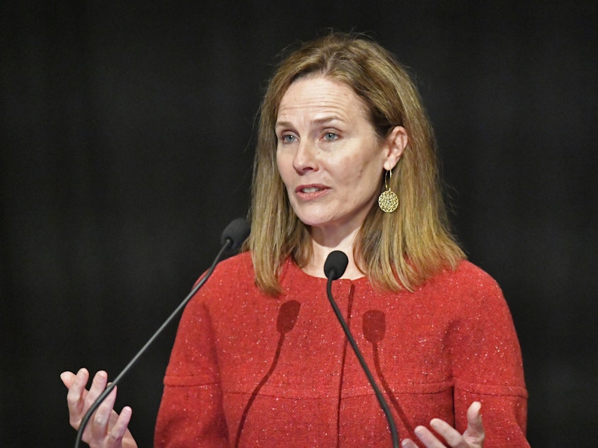 caption: Supreme Court Justice Amy Coney Barrett told an audience Sunday that "judicial philosophies are not the same as political parties."