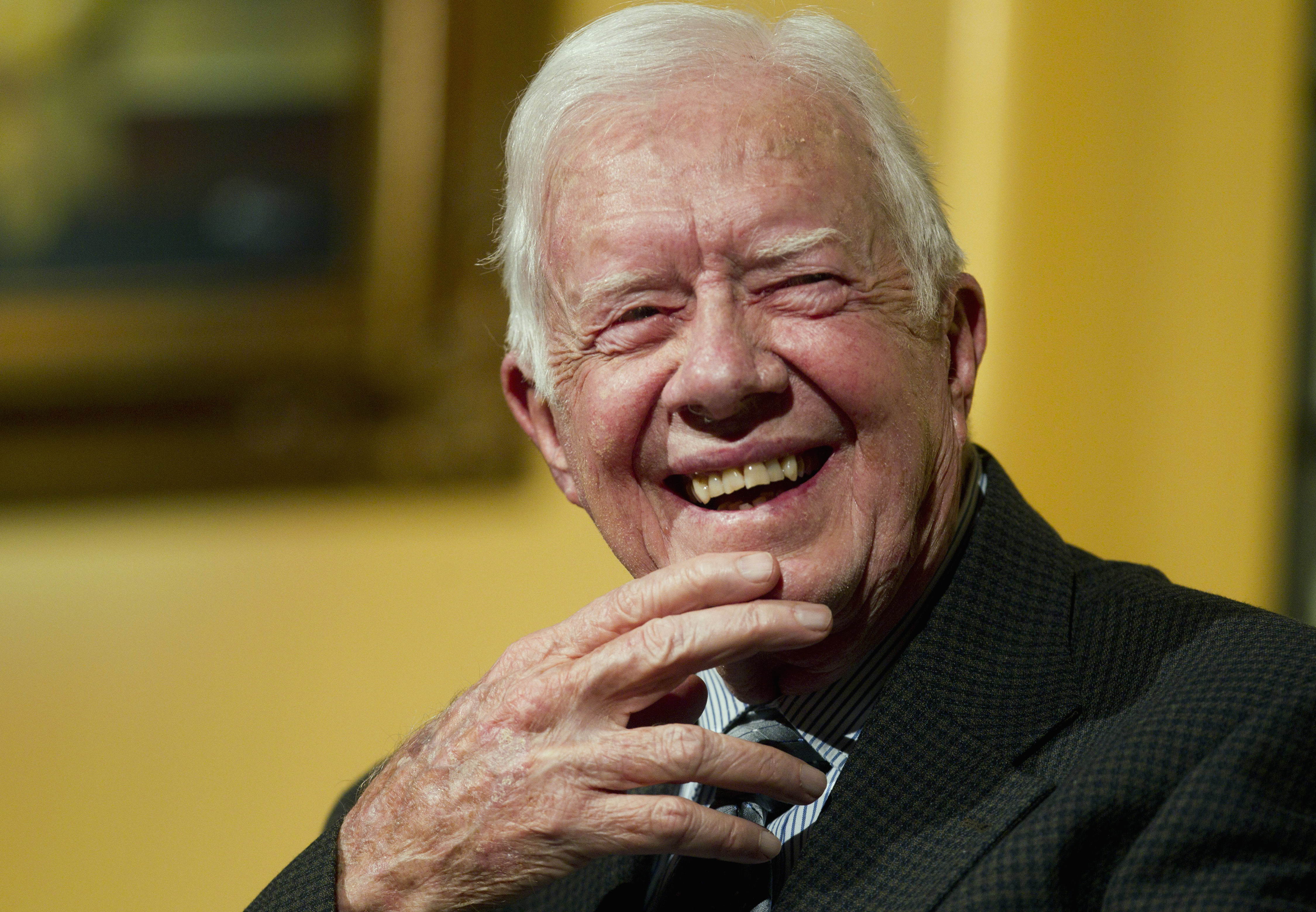 caption: Former U.S. President Jimmy Carter speaks to a group of Duke University alumni at the Carter Center in Atlanta in 2012.