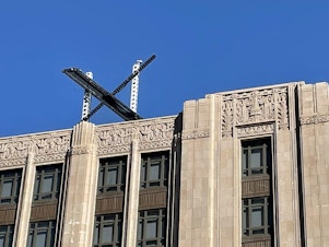 caption: The new X sign is installed Friday on the roof of the San Francisco headquarters of Twitter, which is being rebranded as "X." Elon Musk killed off the Twitter logo on Monday, replacing the world-recognized blue bird with an X as the tycoon accelerates his efforts to transform the floundering social media giant.
