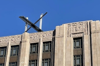 caption: The new X sign is installed Friday on the roof of the San Francisco headquarters of Twitter, which is being rebranded as "X." Elon Musk killed off the Twitter logo on Monday, replacing the world-recognized blue bird with an X as the tycoon accelerates his efforts to transform the floundering social media giant.