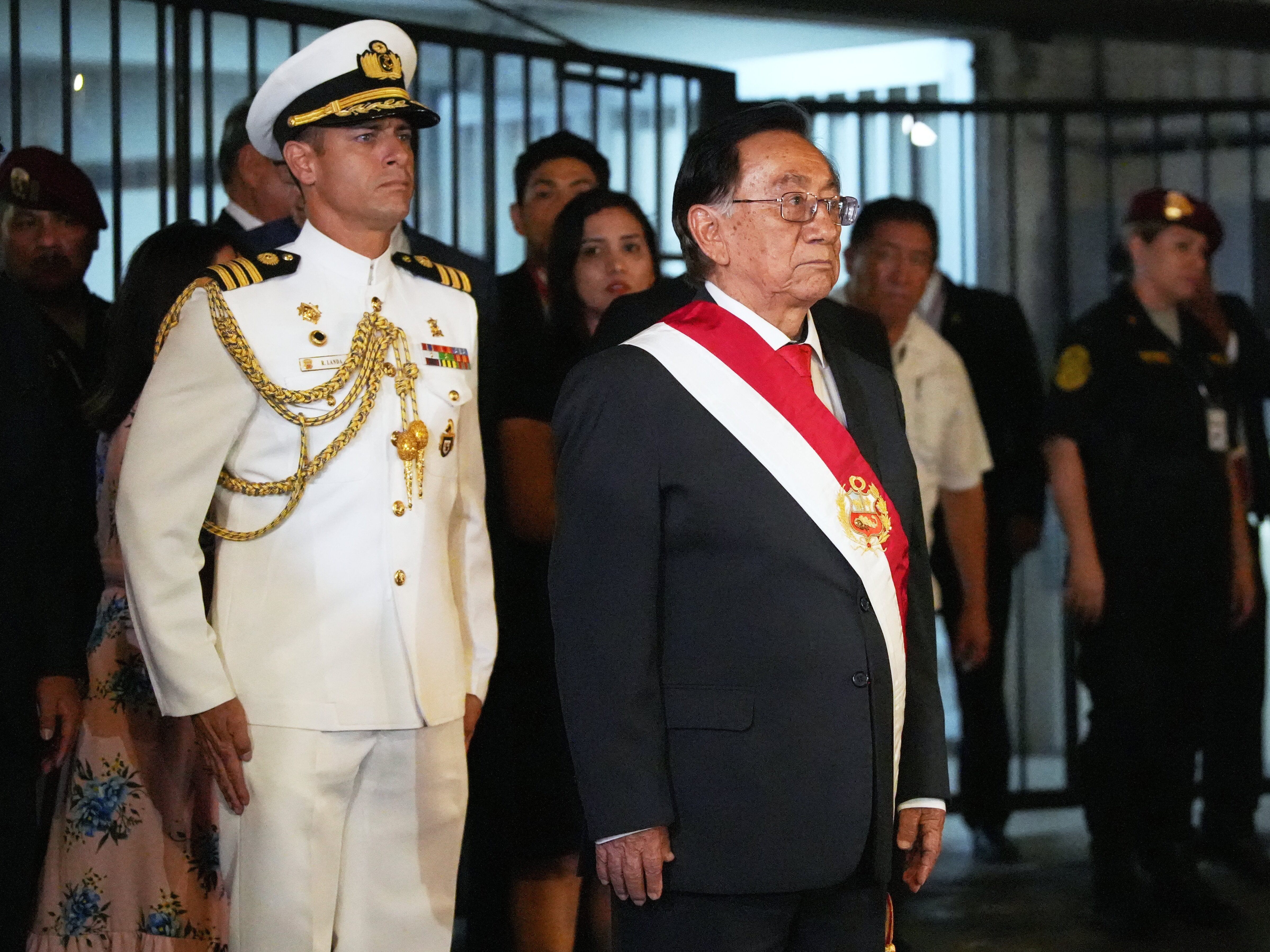 caption: Peru's new President José María Balcázar, front right, leaves at Congress a day after voting to remove interim President Jose Jeri from office in Lima, Peru, Wednesday, Feb. 18, 2026.