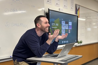 caption: Sean Mullin, a social studies teacher at Lake Washington High School, was an early adopter of artificial intelligence. He thinks it could be a solution to help with teacher burnout.