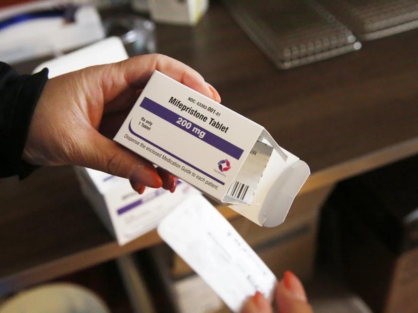 caption: Many of the abortions provided at Seven Hills are done with medication; there's a pharmacy right in the doctor’s office. The first pill people take is mifepristone.