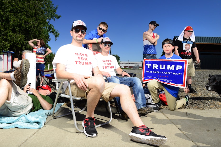 caption: Supporters wearing "Gays for Trump" shirts at a rally for presidential frontronner Donald Trump rally in Lynden, Washington, on Saturday, May 7. 