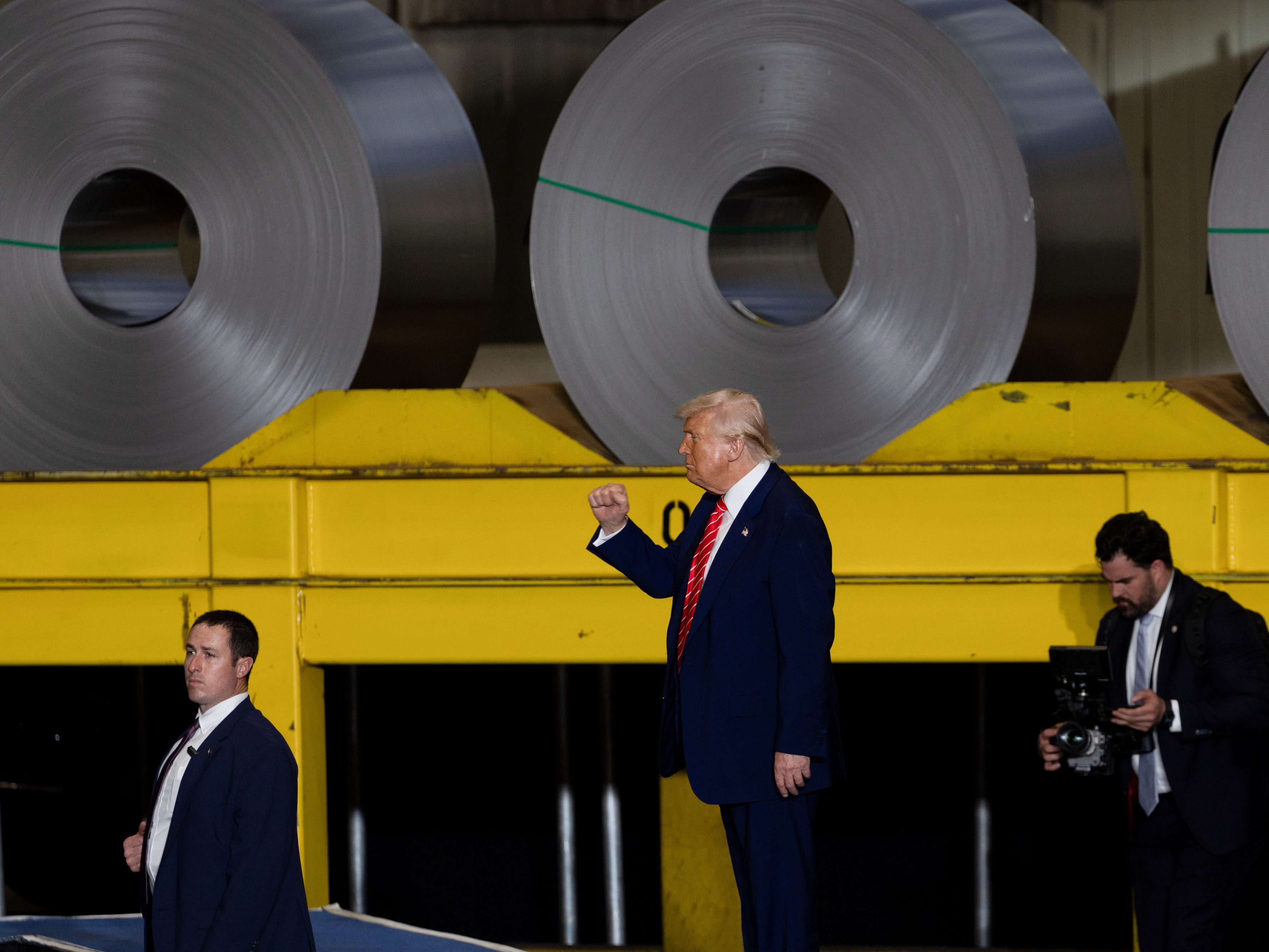 caption: President Trump announced plans to double the tariff on imported steel while visiting a US Steel plant in West Mifflin, Pennsylvania.