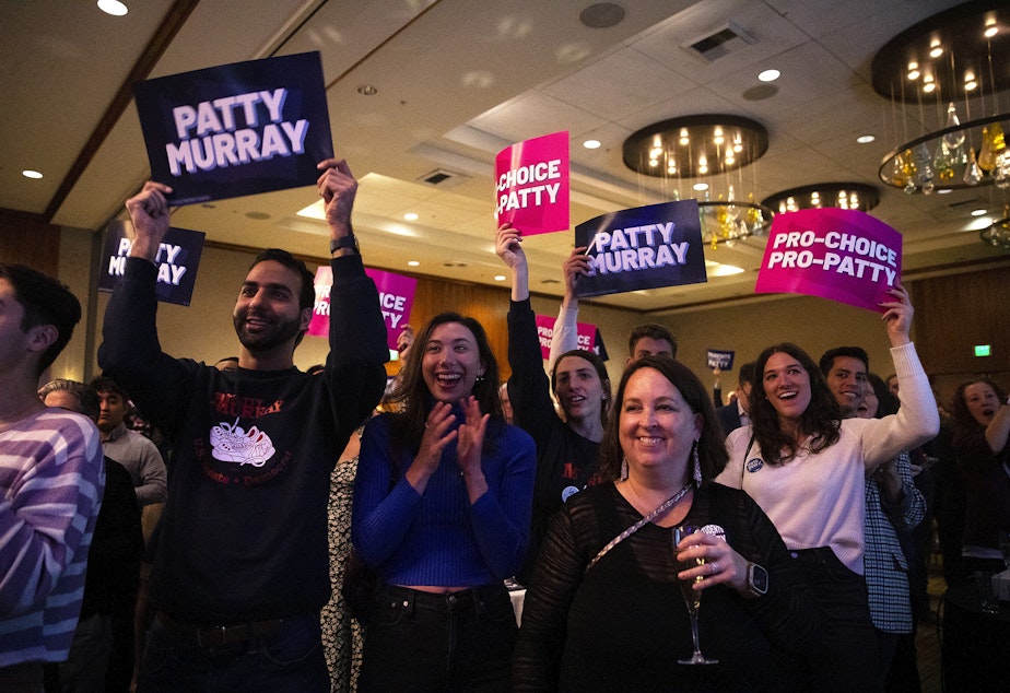 caption: Supporters of U.S. Senator Patty Murray cheer as she takes the stage during an election night party on Tuesday, November 8, 2022, at the Westin in Bellevue. 