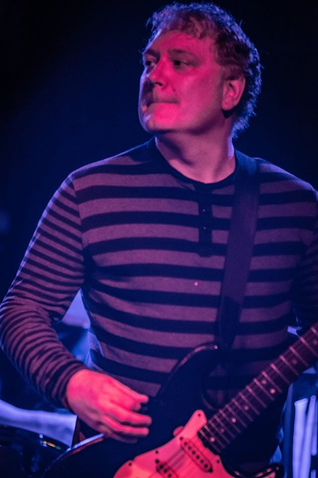 caption: James Burdyshaw on guitar. 