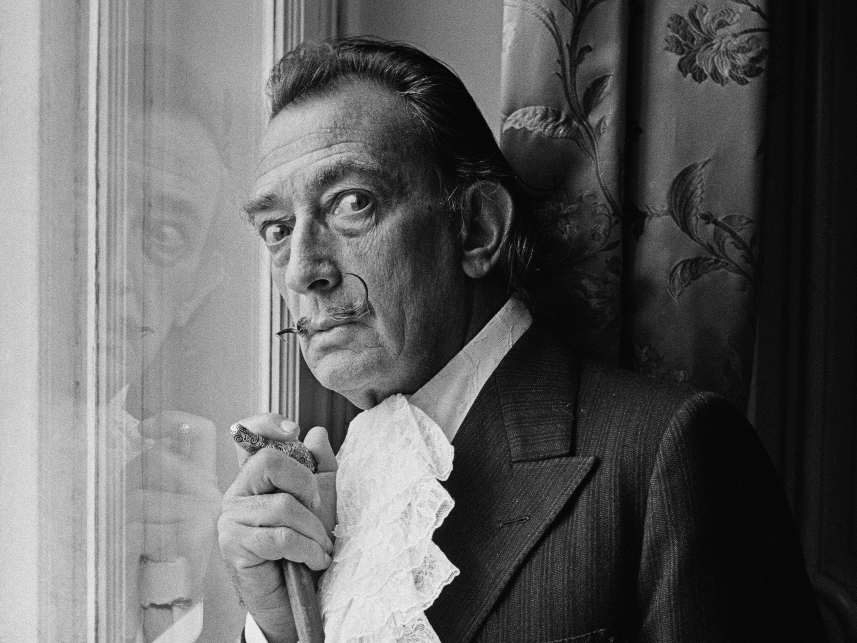 caption: The <a href="https://thedali.org/">Salvador Dalí Museum</a> in St. Petersburg, Fla., didn't let COVID-19 stop it from showcasing its "<a href="https://thedali.org/exhibit/midnight-in-paris-online/">Midnight in Paris</a>" exhibition. Above, the Spanish surrealist painter in 1964.