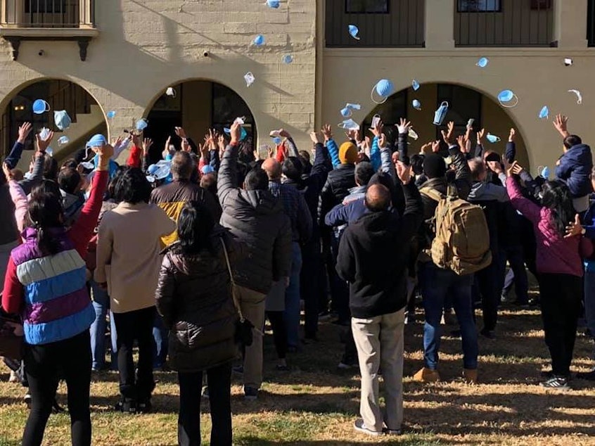 caption: "Our guests at March Air Reserve Base are happy to see an official end today to their 14-day quarantine," Riverside University Health System - Public Health said via Facebook Tuesday. The 195 Americans are now free to leave the base.