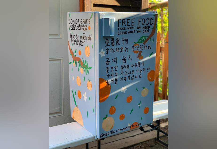 caption: A Seattle Community Fridge, freshly painted and about to be placed at the Danny Woo Community Garden.