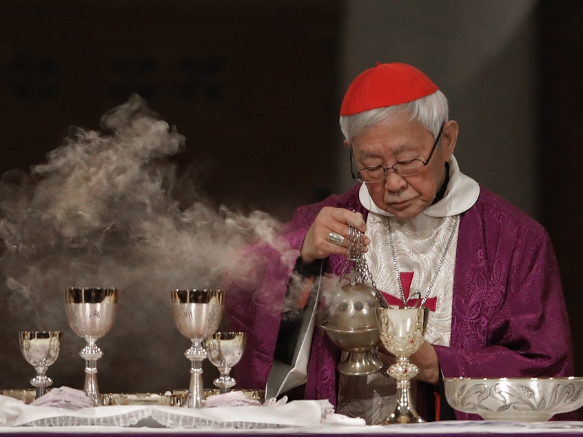 caption: Cardinal Joseph Zen, a vocal opponent of attempts by Beijing and the Vatican at rapprochement, is shown presiding over a vigil Mass for Bishop Michael Yeung in Hong Kong, Thursday, Jan. 10, 2019.