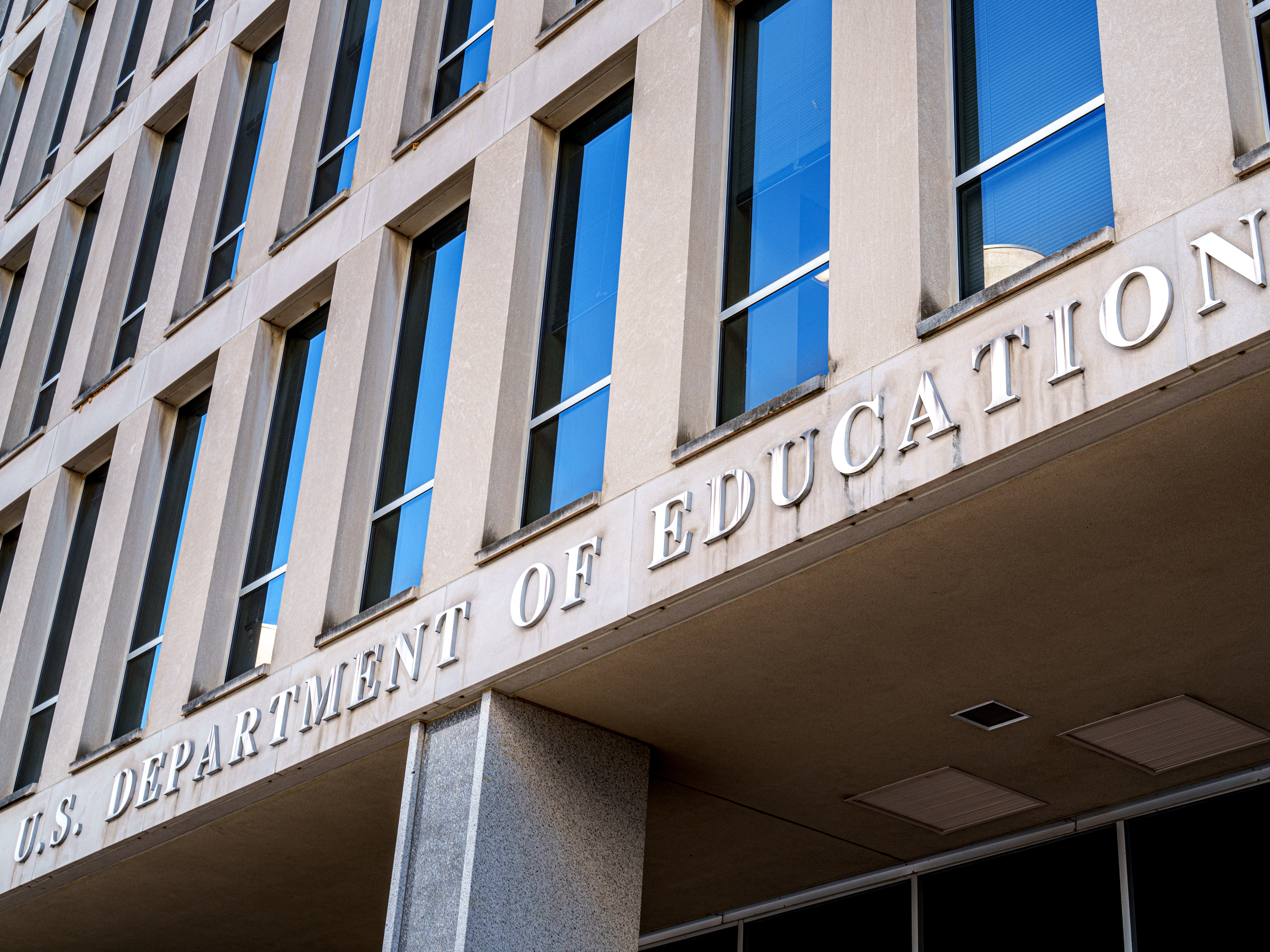 caption: The entrance of the U.S. Department of Education headquarters in Washington, D.C.