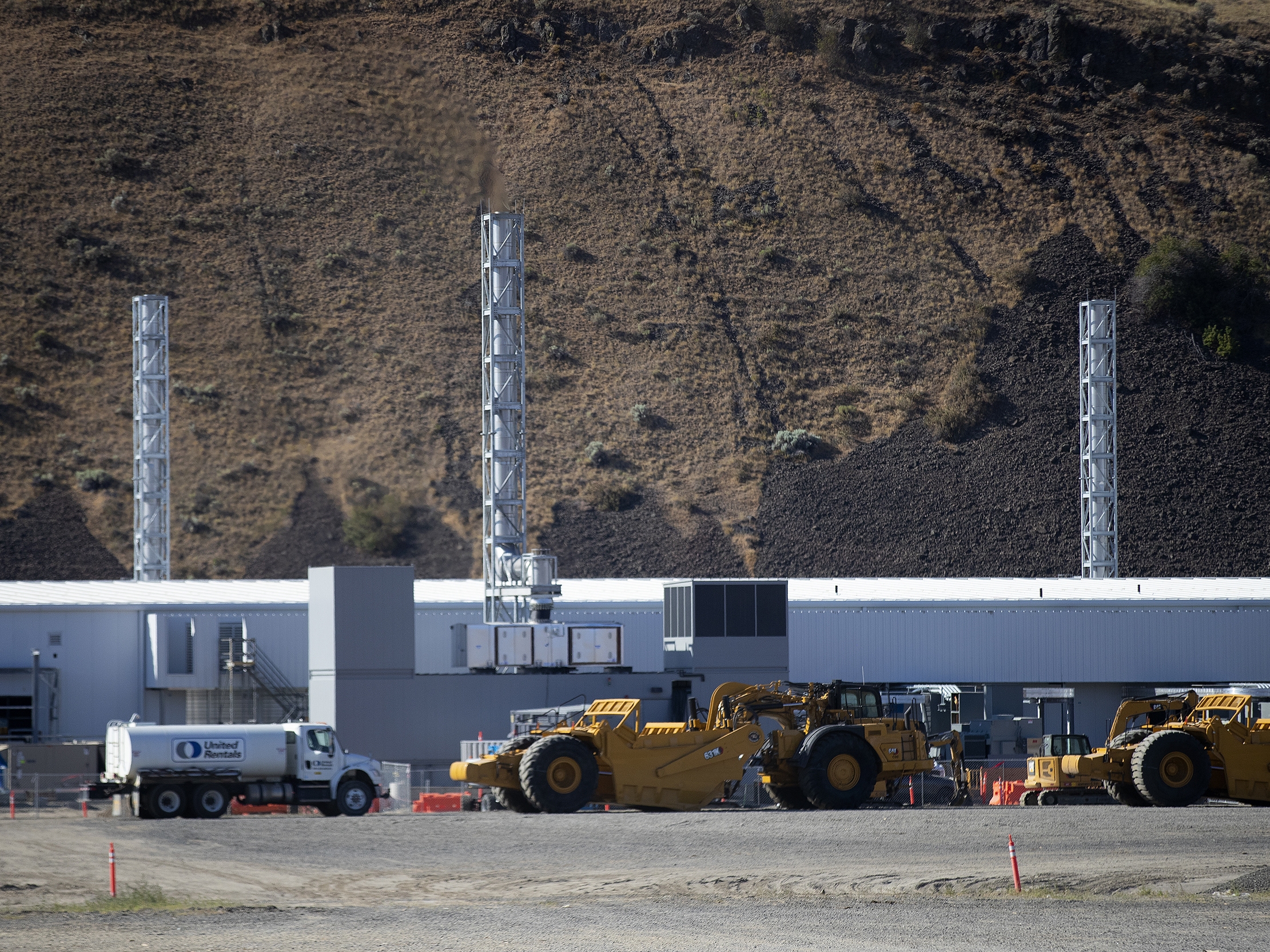 caption: Construction continues on a new Microsoft data center on Friday, July 18, 2025, in Malaga, Washington.