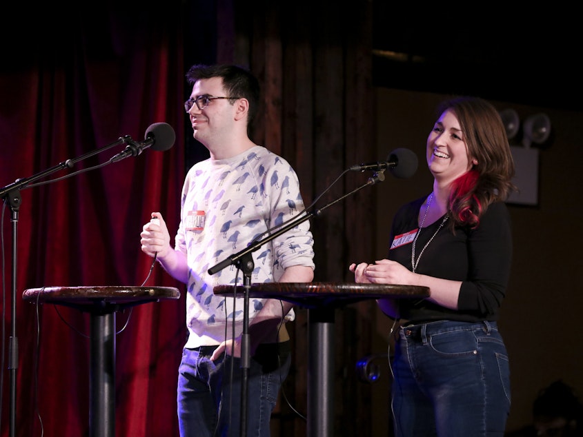 caption: Contestants Charlie Rubinovitz and Katie Rogers appear on Ask Me Another at the Bell House in Brooklyn, New York.