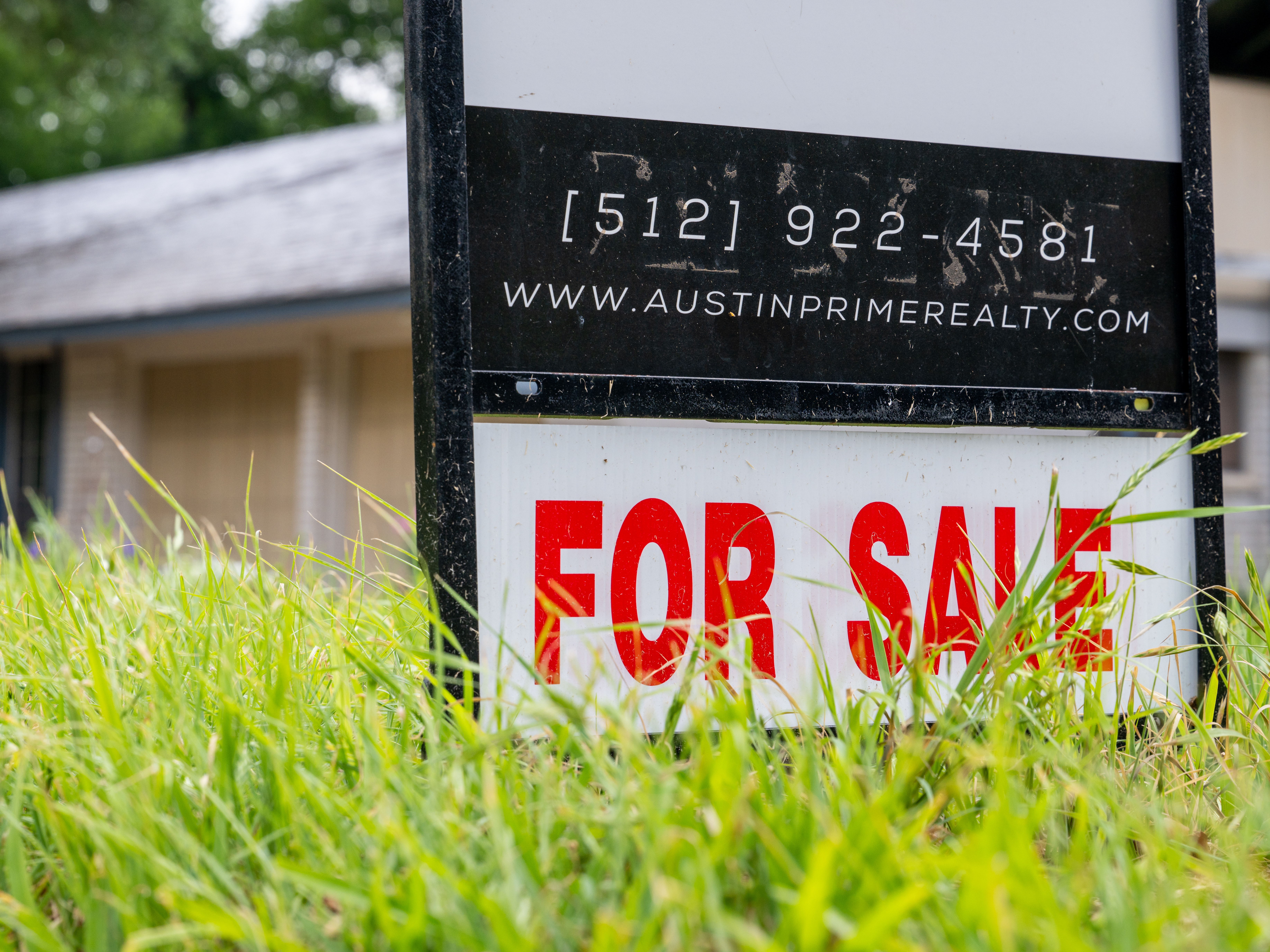 caption: A home for sale in April in Austin, Texas.