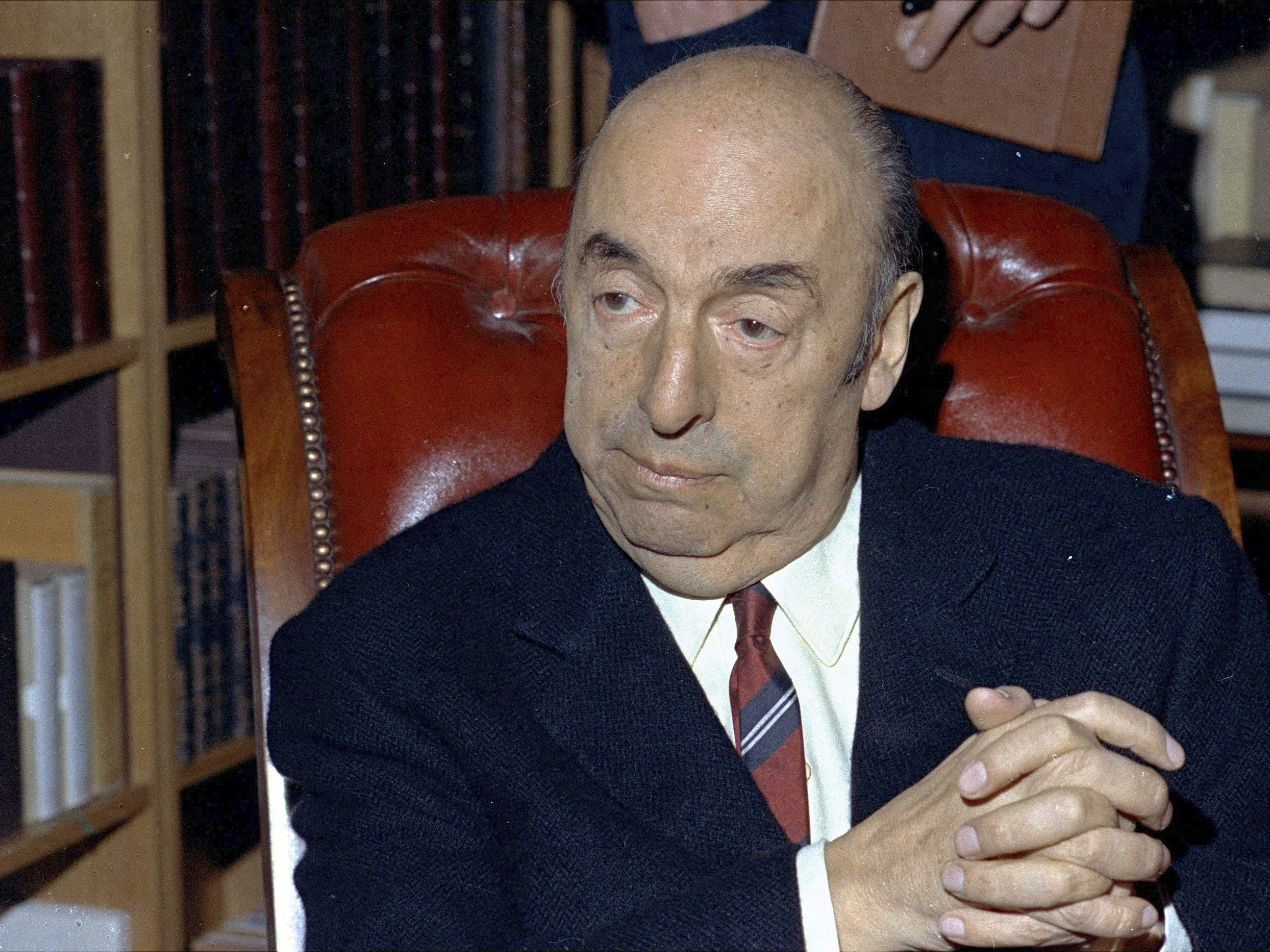caption: Nobel Prize-winning poet Pablo Neruda sits in Paris in October 1971.