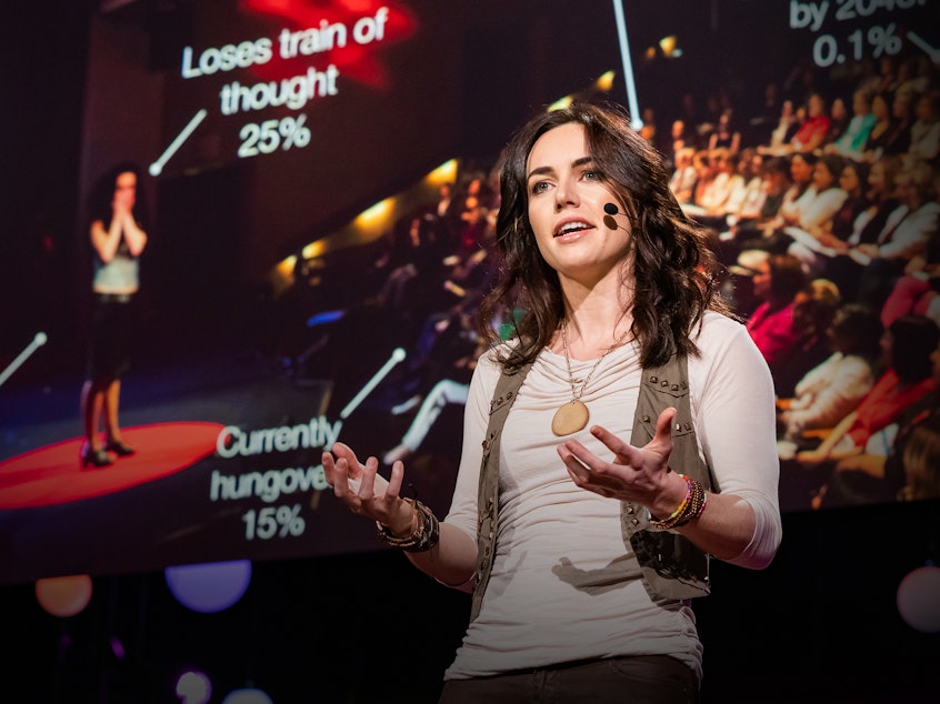 caption: Liv Boeree on the TED stage.