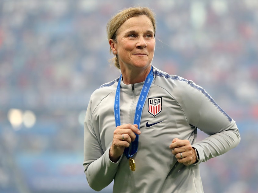 caption: U.S. Women's National Team coach Jill Ellis celebrates after the American squad defeated the Netherlands on July 7 in France to win the FIFA Women's World Cup.