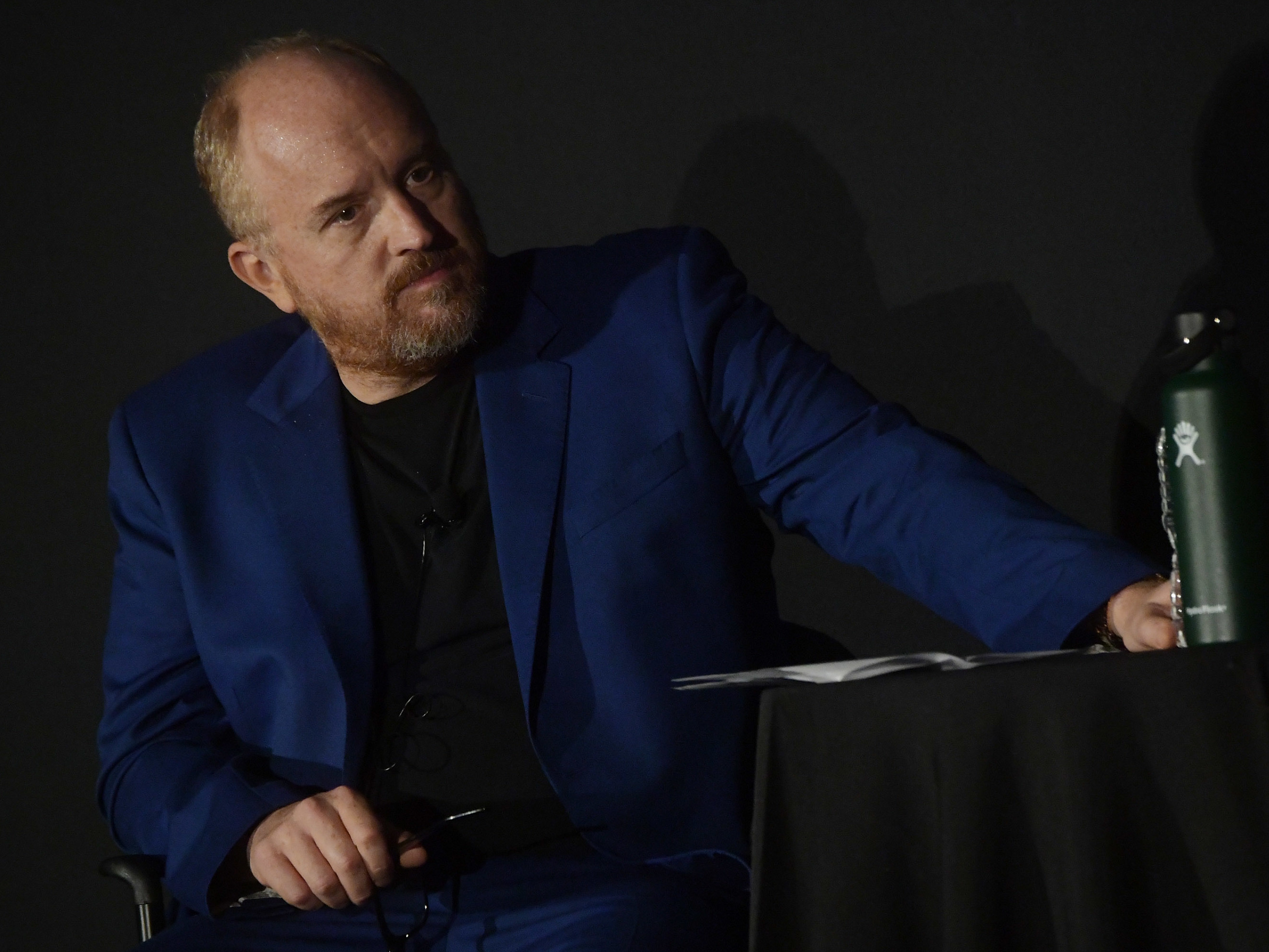caption: Just five years ago, networks such as HBO, Netflix and FX were cutting ties with the formerly revered Louis C.K. and pulled past and upcoming programs alike. Now he is back and has a Grammy.