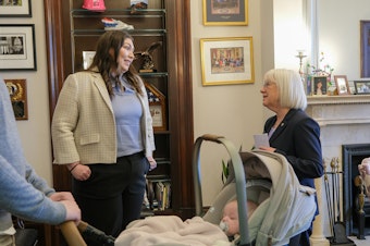 caption: Kayla Smith with U.S. Sen. Patty Murray (D-Washington). Smith was Murray's guest at the 2024 State of the Union address. Smith was living in Idaho, which banned abortions, when she faced serious medical issues while pregnant. She travelled to Washington for an abortion. 