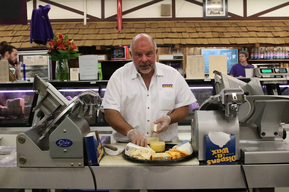 caption: Jack Miller, owner of Husky Deli and Ice Cream, is one of the long-time shareholders in the West Seattle Junction parking lots. Recently, a dramatic shift in who owns shares has put the future of the parking lots in play.