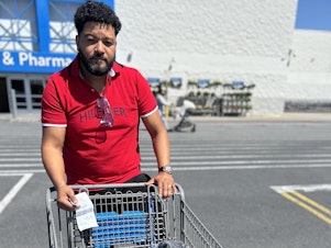 caption: Luis Escarraman spent $139 when he picked up some vitamin C and a few items of clothing for himself and his daughter. "I need to work extra to get what I used to have before," he told NPR.