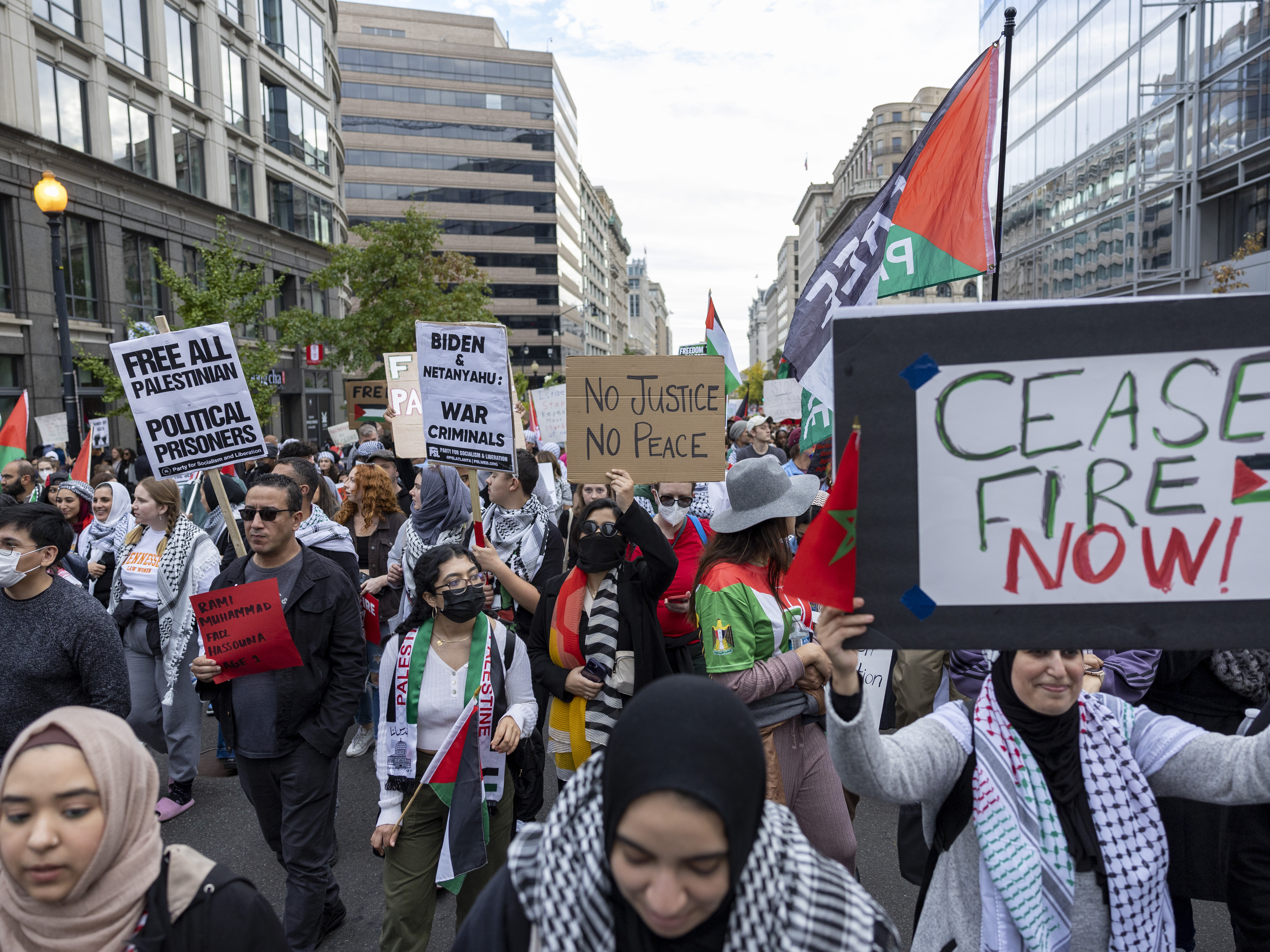caption: People march during a pro-Palestinian demonstration in Washington on Saturday.