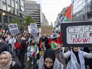 caption: People march during a pro-Palestinian demonstration in Washington on Saturday.