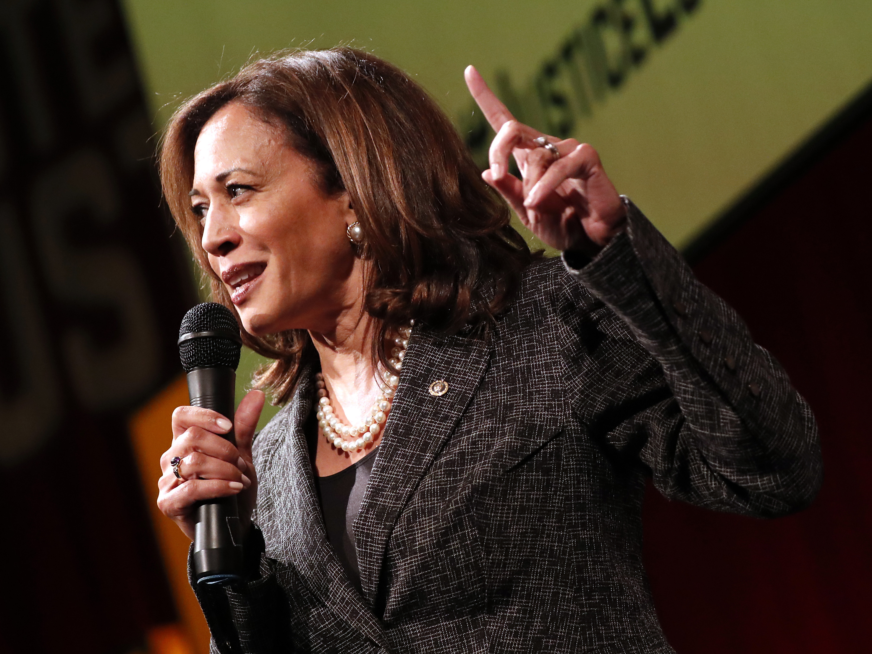 caption: Sen. Kamala Harris, D-Calif., speaks at Vote For Justice: An Evening of Empowerment with activists and artists at the Newseum in May 2018.