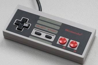 caption: Players would enter up, up, down, down, left, right, left, right, B, A and Start on a controller to activate the "Konami code." It was first used in the game Gradius, but later made famous on Nintendo with Contra.