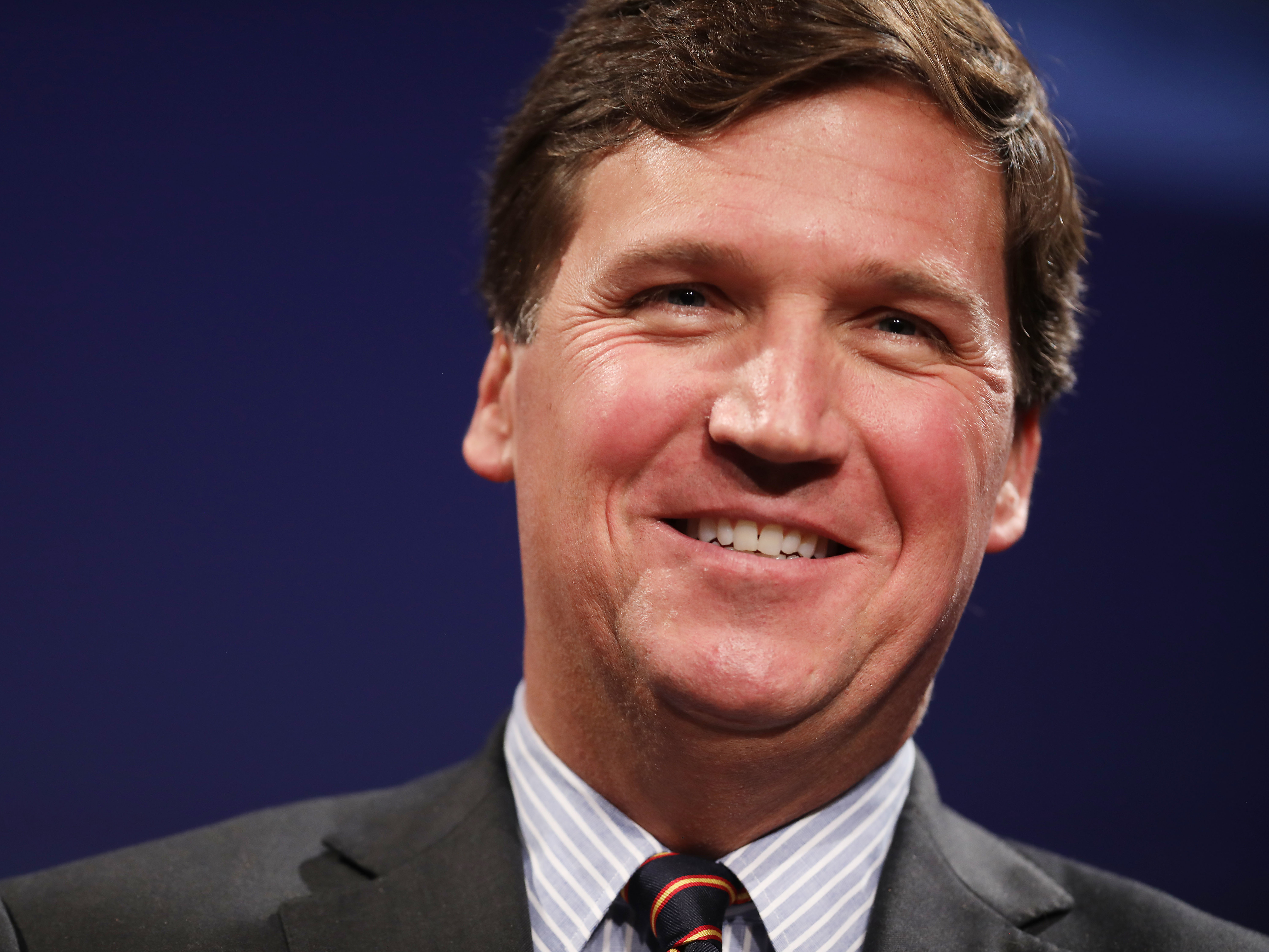 caption: Fox News host Tucker Carlson's special on the Jan. 6 riot at the U.S. Capitol was the last straw for two network commentators. Stephen Hayes and Jonah Goldberg have resigned.