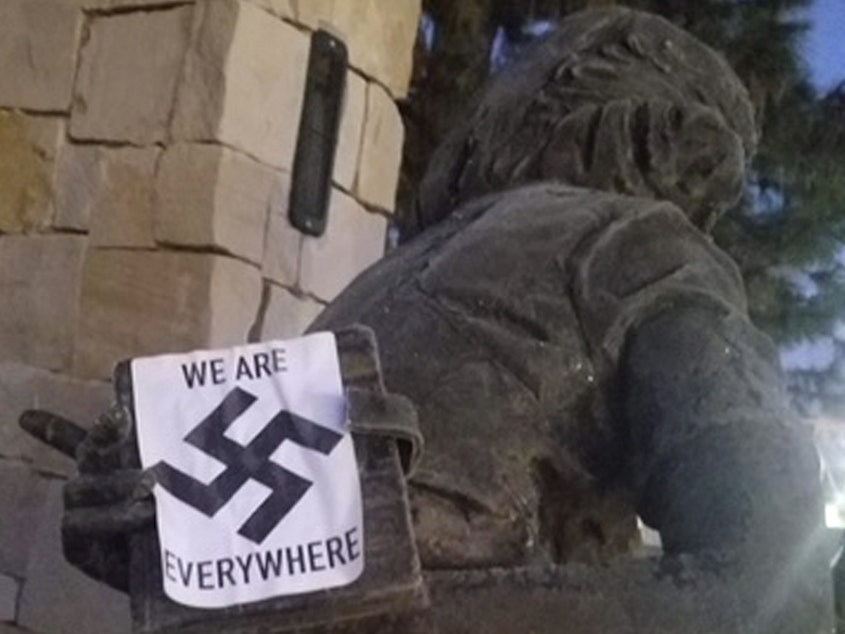 caption: A swastika sticker on a statue at the Idaho Anne Frank Human Rights Memorial in Boise. The vandalism took place sometime between Monday evening and Tuesday morning, Boise police said.