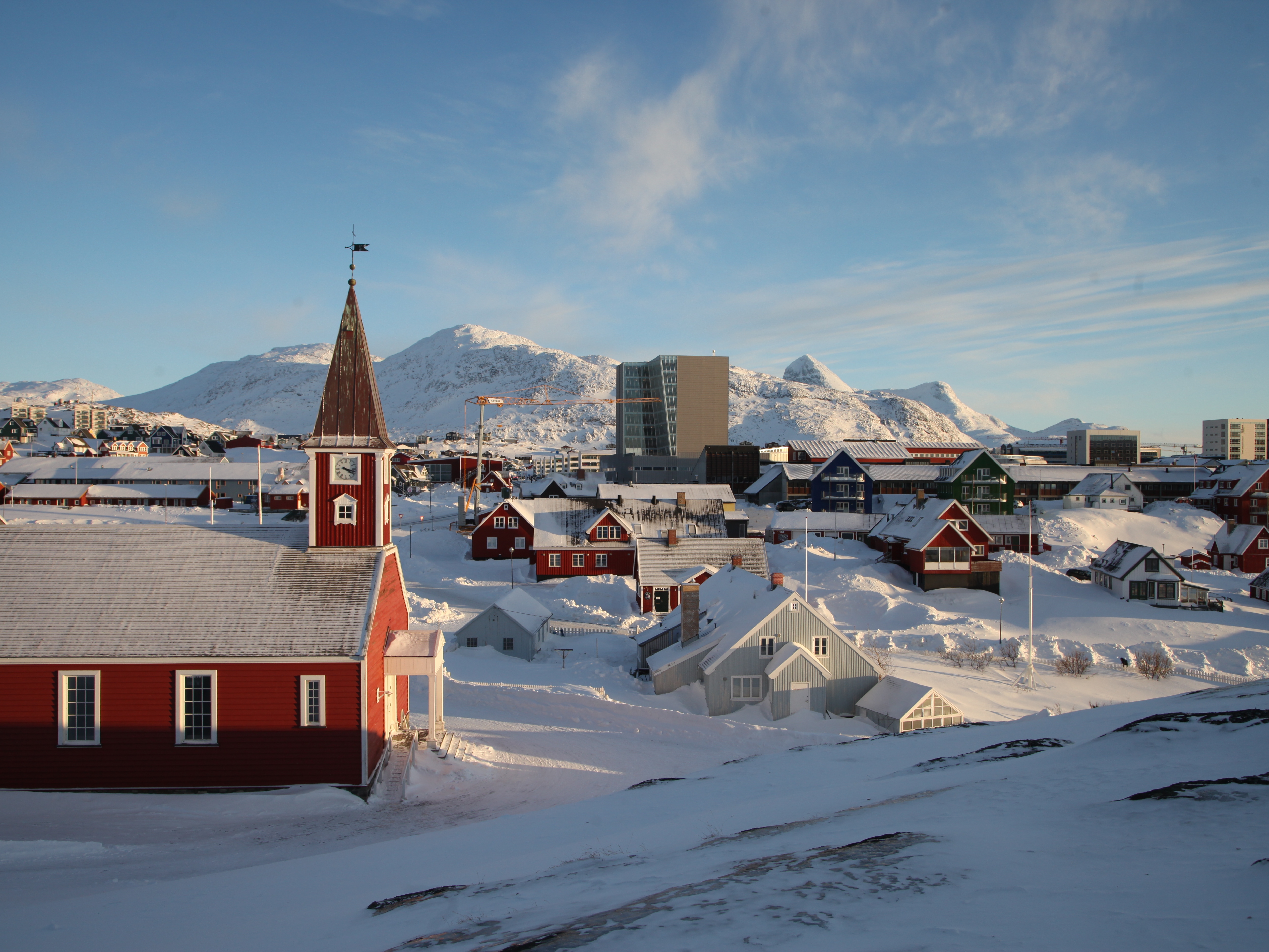 caption: A view of the city center of the Greenlandic capital Nuuk. Trump's renewed interest in acquiring the island hasn't gone over well with Greenland or Denmark.