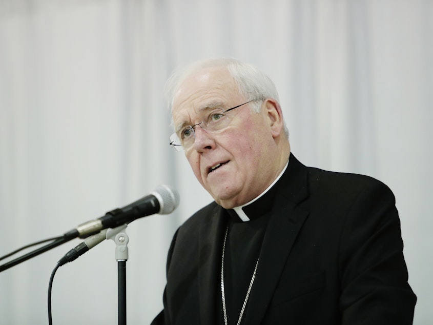 caption: Richard Malone, seen during a news conference last year, has resigned as bishop of the Catholic diocese based in Buffalo, N.Y. During his tenure, the diocese attracted intense scrutiny over its alleged mishandling of sexual abuse allegations.