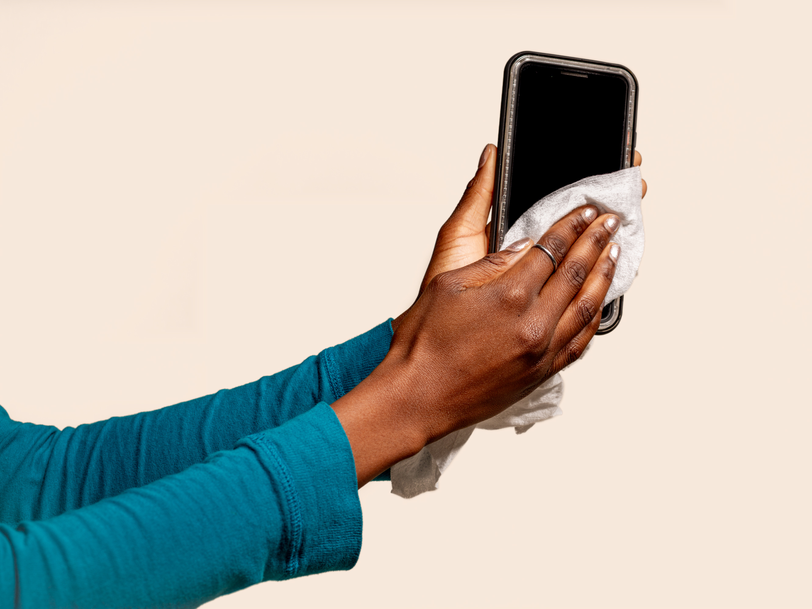 caption: One way to fend off germs: clean your phone. Your phone is your 'third hand'; one that harbors the multitude of germs and bacteria we come into contact with each day.